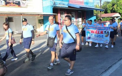 <p><strong>WALK FOR A CAUSE.</strong> The contingent from Bacolod City Police Office during the ‘Walk for a Cause for the Child Laborers in Negros Occidental’ on Tuesday (May 1, 2018).  <em>(Photo courtesy of Bacolod City Police Office)</em></p>